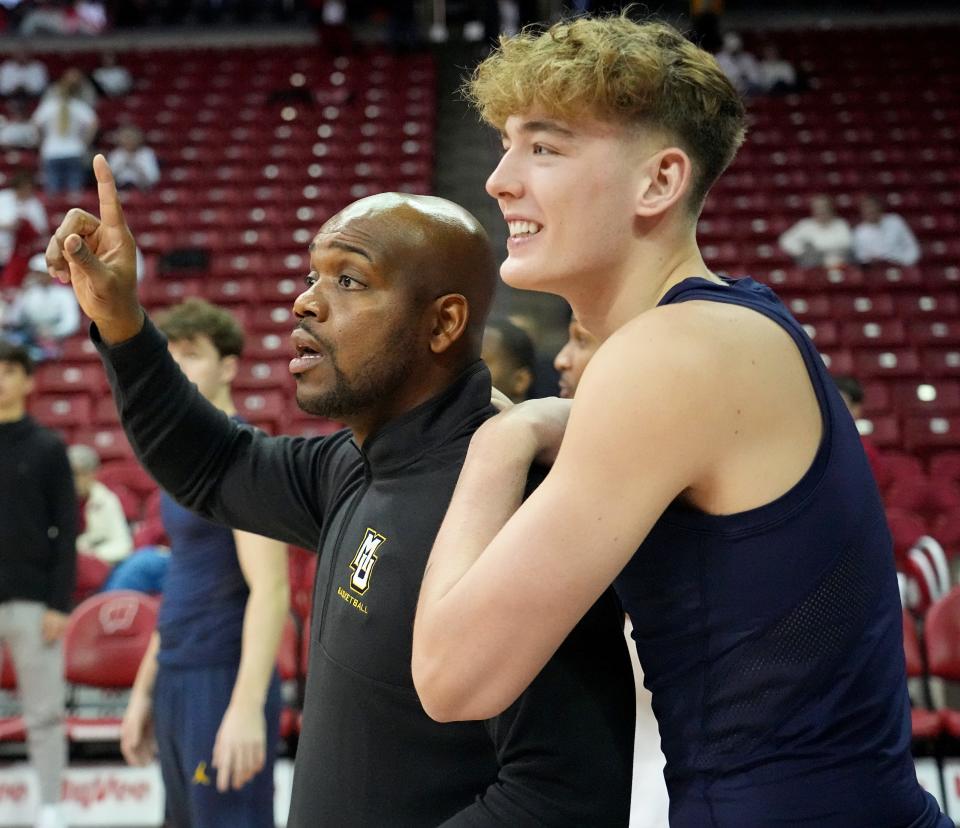 Marquette assistant coach DeAndre Haynes, left, is shown with forward Jack Riley before their game against Wisconsin December 2, 2023 at the Kohl Center in Madison, Wisconsin.

Mark Hoffman/Milwaukee Journal Sentinel