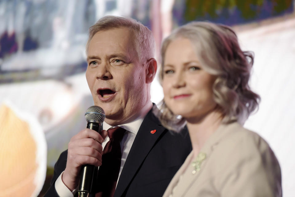 Chairman of the Finnish Social Democratic Party Antti Rinne with his wife Heta Ravolainen-Rinne speaks, at the parliamentary election party in Helsinki, Sunday, April 14, 2019. Voters in Finland are casting ballots in a parliamentary election Sunday after climate change dominated the campaign, even overshadowing topics like reforming the nation's generous welfare model. (Antti Aimo-Koivisto/Lehtikuva via AP)