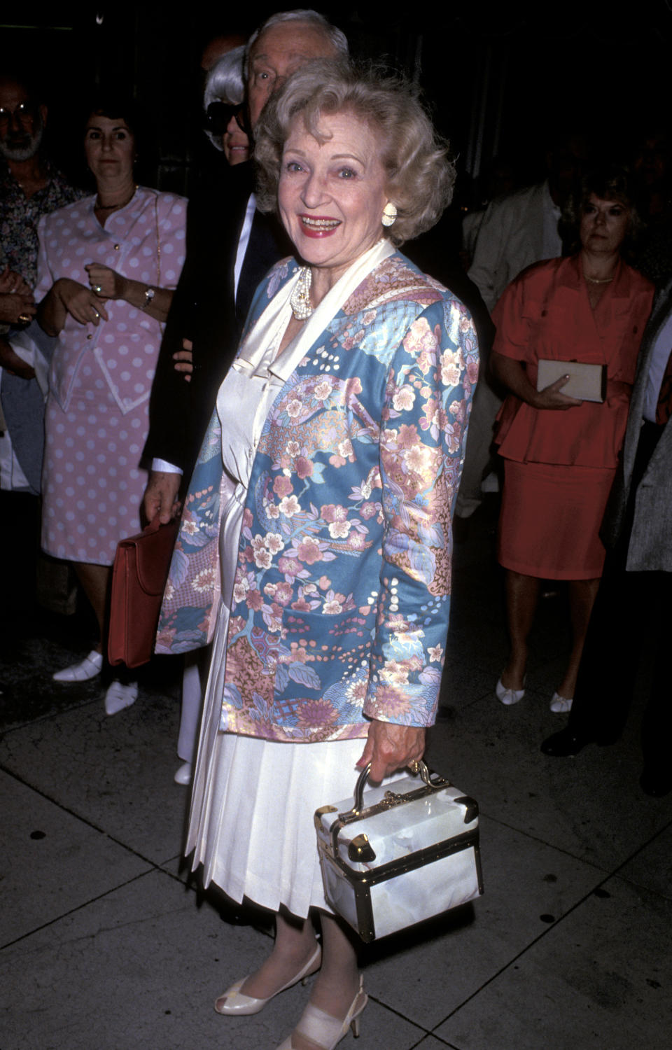 Betty in a floral printed blazer