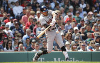 Houston Astros' Carlos Correa hits a two-run home run against the Boston Red Sox during the third inning of a baseball game against the Boston Red Sox, Sunday, May 19, 2019, at Fenway Park in Boston. (AP Photo/Winslow Townson)