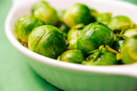 <p>One cup of cooked Brussels sprouts is an excellent source of vitamins A, C, and K and folate, as well as a good source of fiber, thiamine, vitamin B6, potassium, and iron. “Brussels sprouts are also cruciferous veggies that have antioxidant and anti-inflammatory benefits,” Elisa Zied, registered dietitian and author of <a href="http://www.barnesandnoble.com/w/younger-next-week-elisa-zied/1116528242" rel="nofollow noopener" target="_blank" data-ylk="slk:Younger Next Week" class="link "><i>Younger Next Week</i></a>, tells Yahoo Health.</p><p><i>(Photo: Stocksy)</i><br></p>