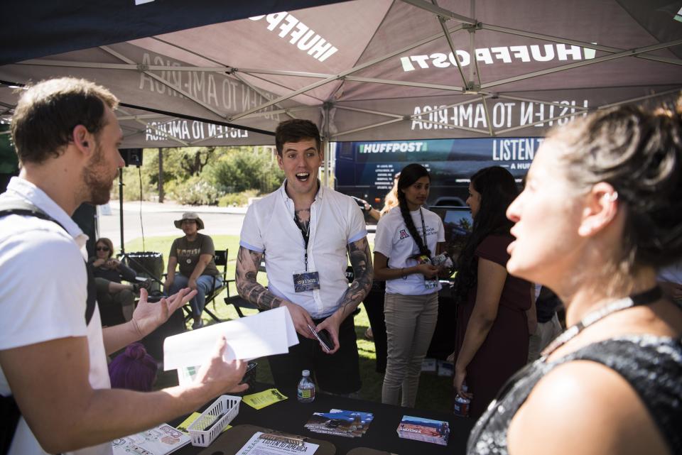 Nate Airulla speaks with James Michael Nichols and Rachel Elman during HuffPost's visit.