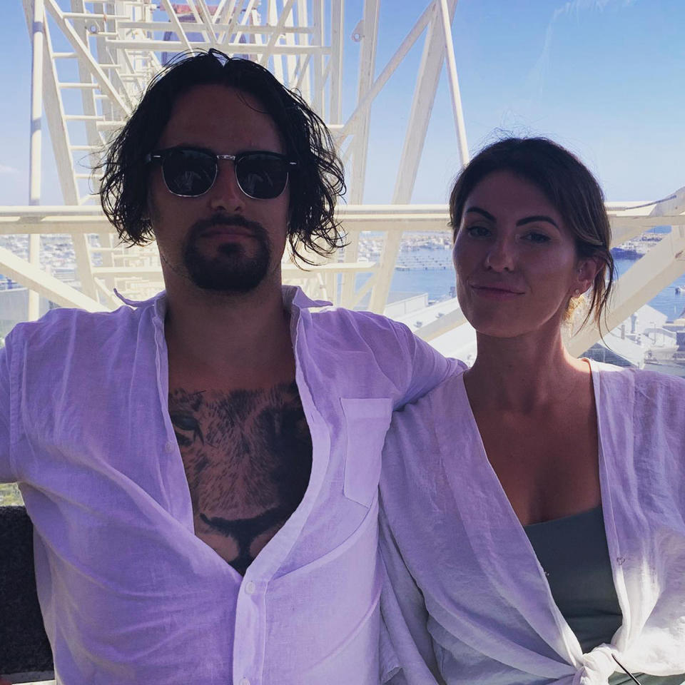 MAFS star Jesse Burford with sunglasses sitting with a brunette on a ferris wheel
