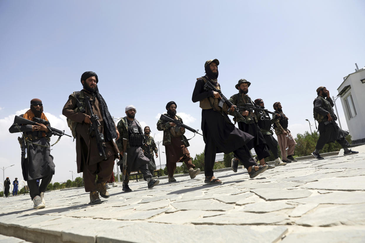 Taliban fighters patrol in Kabul on Aug. 19, 2021. (Rahmat Gul / AP file)