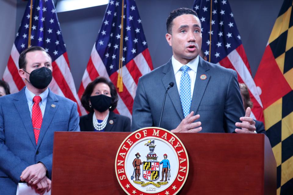 Sen. Will Smith, a Montgomery County Democrat who chairs the Maryland Senate Judicial Proceedings Committee, talks about legislation to fight crime during a news conference on Thursday, Feb. 2, 2022, in Annapolis. Maryland Senate President Bill Ferguson is standing left, and Sen. Pam Beidle is standing left and middle, behind Smith and Ferguson.