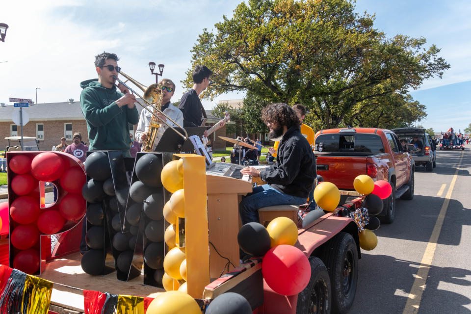 The Phi Mu Alpha float features a jazz ensemble theme Saturday at the WT Homecoming Parade in Canyon.