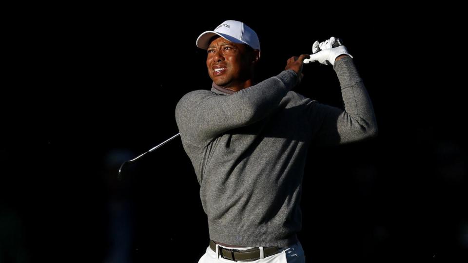 PHOTO: Tiger Woods of the United States follows his shot on the 14th fairway during the continuation of the first round of the 2024 Masters Tournament at Augusta National Golf Club, Apr. 12, 2024, in Augusta, Georgia.  (Warren Little/Getty Images)