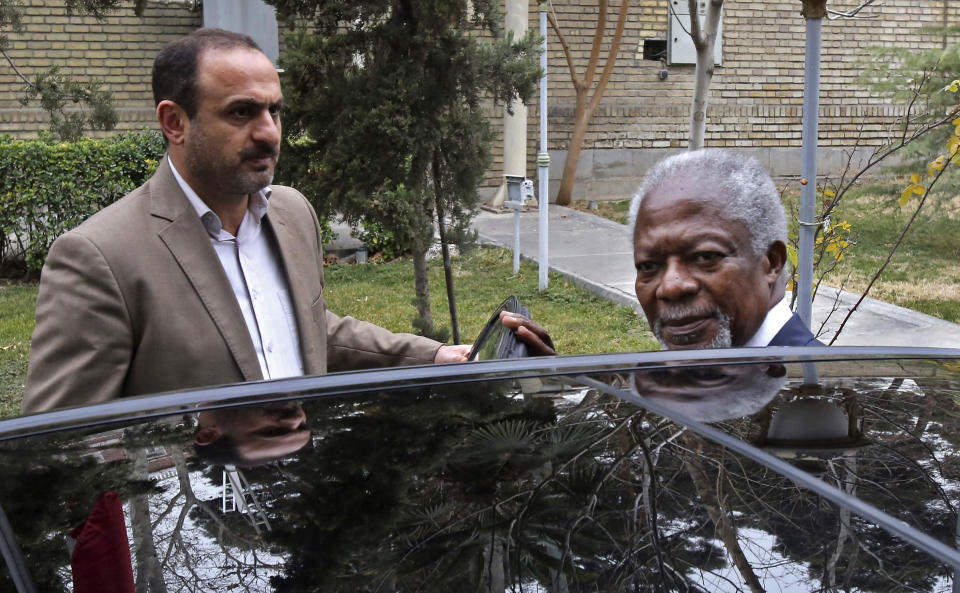 Former United Nations Secretary-General Kofi Annan, gets into his car after meeting with secretary of Iran's Supreme National Security Council, Ali Shamkhani in Tehran, Iran, Tuesday, Jan. 28, 2014. (AP Photo/Vahid Salemi)