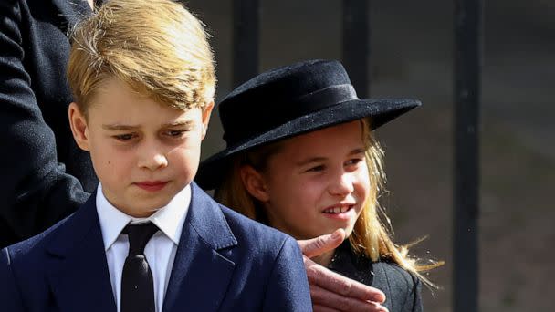 PHOTO: Prince George and Princess Charlotte walk after a service at Westminster Abbey on the day of the state funeral and burial of Britain's Queen Elizabeth II, in London, Sept. 19, 2022. (Hannah Mckay/Reuters)