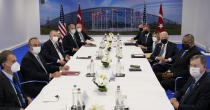 President Joe Biden, center right, and Turkish President Recep Tayyip Erdogan, center left, visit during a bilateral meeting while attending the NATO summit at NATO headquarters in Brussels, Monday, June 14, 2021. (AP Photo/Patrick Semansky)