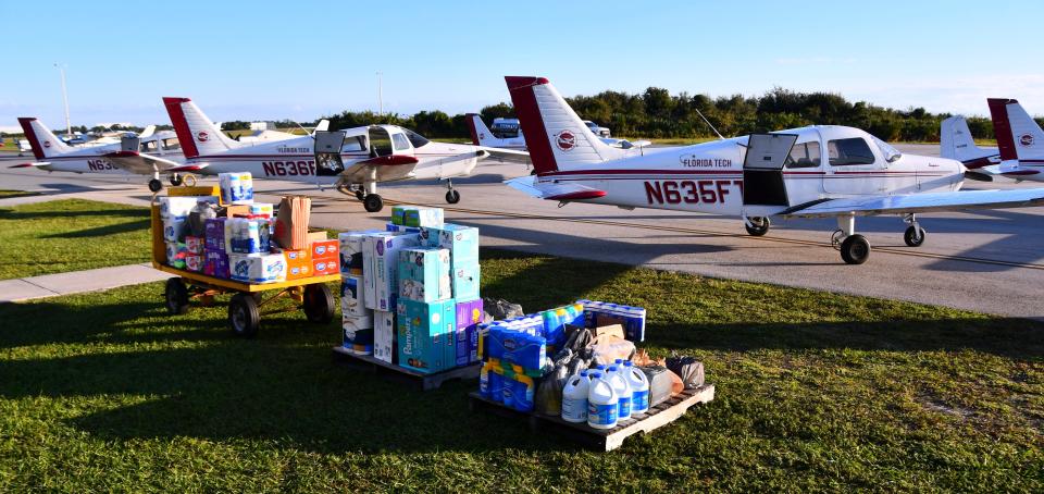 Pallets of Hurricane Ian disaster supplies await loading aboard six Florida Institute of Technology planes Friday morning at Melbourne Orlando International Airport.