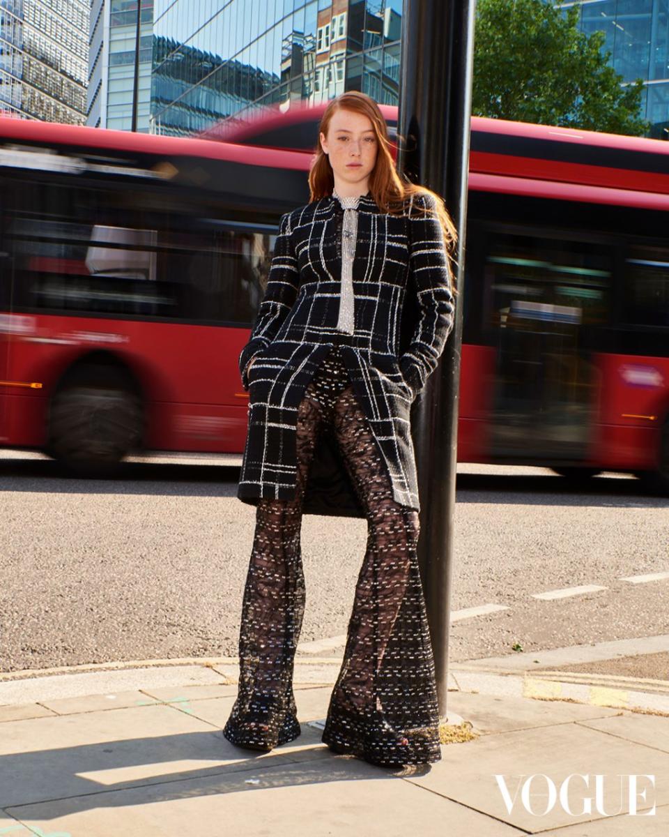 Coat, top, pants, tie and shoes, all Chanel.