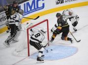 Nov 19, 2017; Las Vegas, NV, USA; Vegas Golden Knights center William Karlsson (71) scores as Los Angeles Kings goalie Jonathan Quick (32) is caught out of position during a game at T-Mobile Arena. Stephen R. Sylvanie-USA TODAY Sports