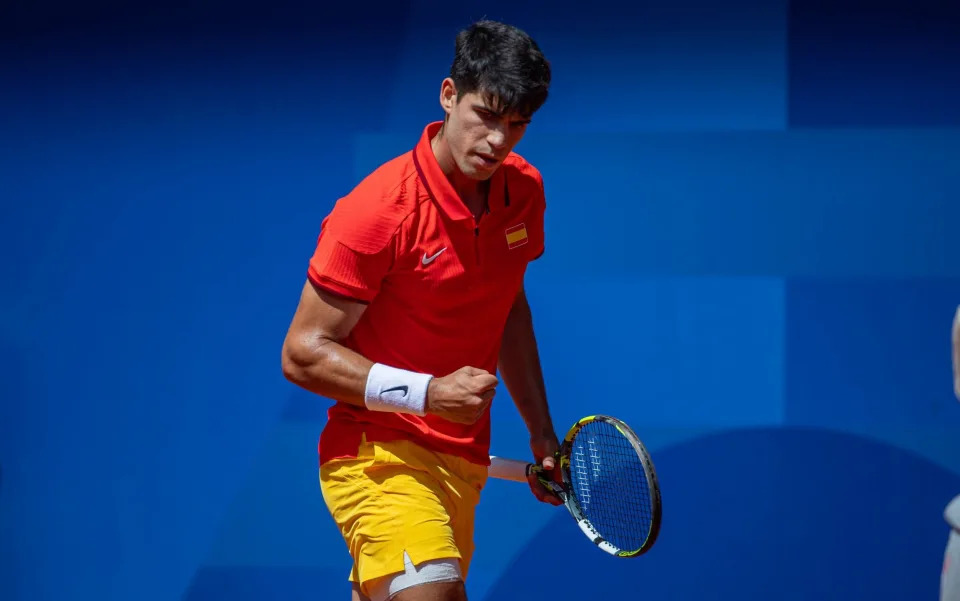 Alcaraz celebrates winning the game against Djokovic