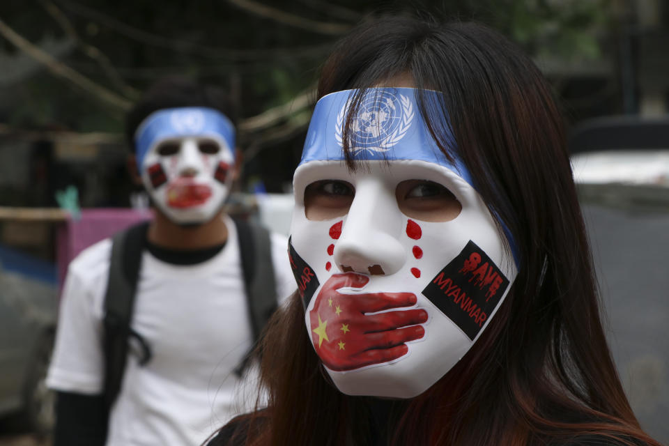 Young demonstrators participate in an anti-coup mask strike in Yangon, Myanmar, Sunday, April 4, 2021. Threats of lethal violence and arrests of protesters have failed to suppress daily demonstrations across Myanmar demanding the military step down and reinstate the democratically elected government. (AP Photo)