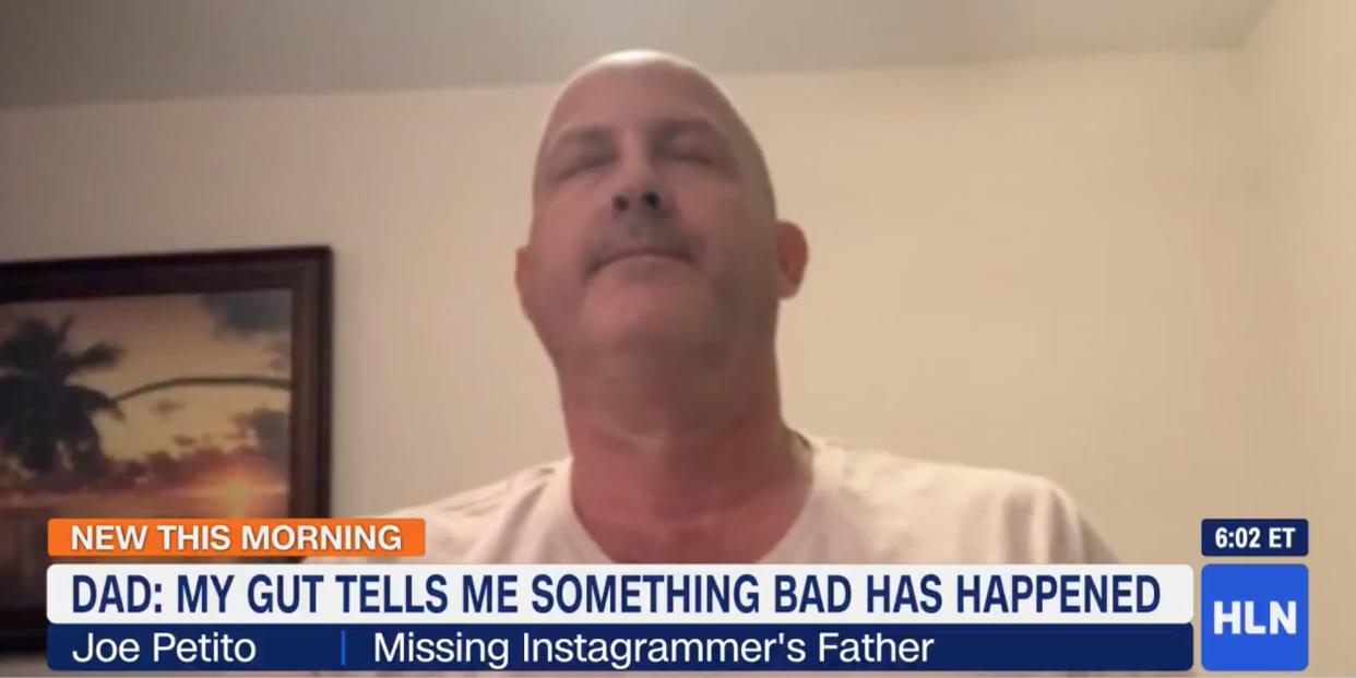 A screenshot of Joe Petito, eyes closed in contemplation, during an interview with HLN TV. Chyron reads: Dad: my gut tells me something bad has happened.