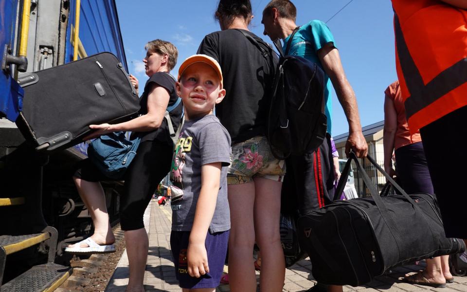 Evacuees trying to escape the war with Russia board a train to Dnipro on June 20, 2022 in Pokrovsk, Ukraine. - Scott Olson/Getty Images