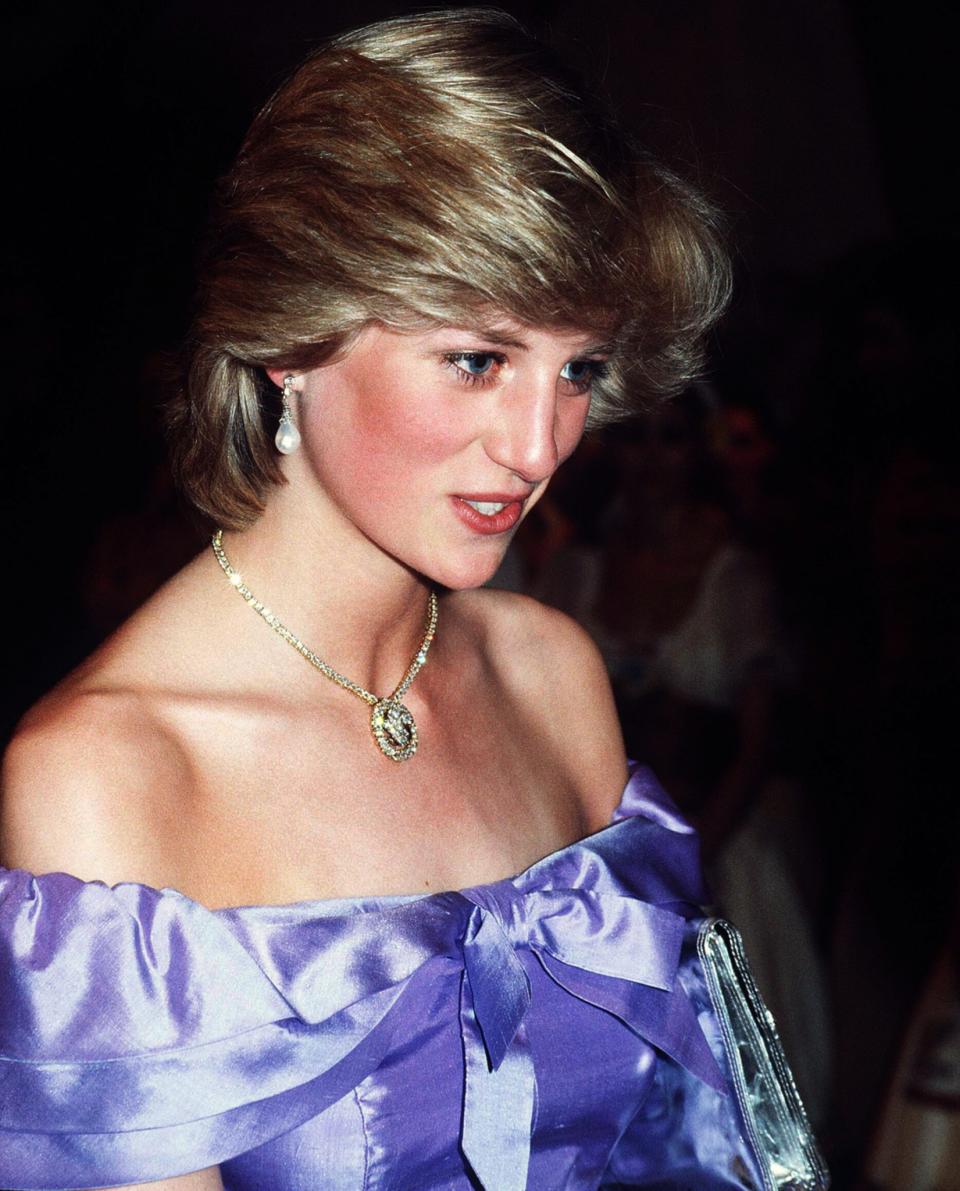 <p>Princess Di had a good three or four iconic hairstyles, but this swept-back 80s look has to be one of our favourites. <em>[Photo: PA]</em> </p>