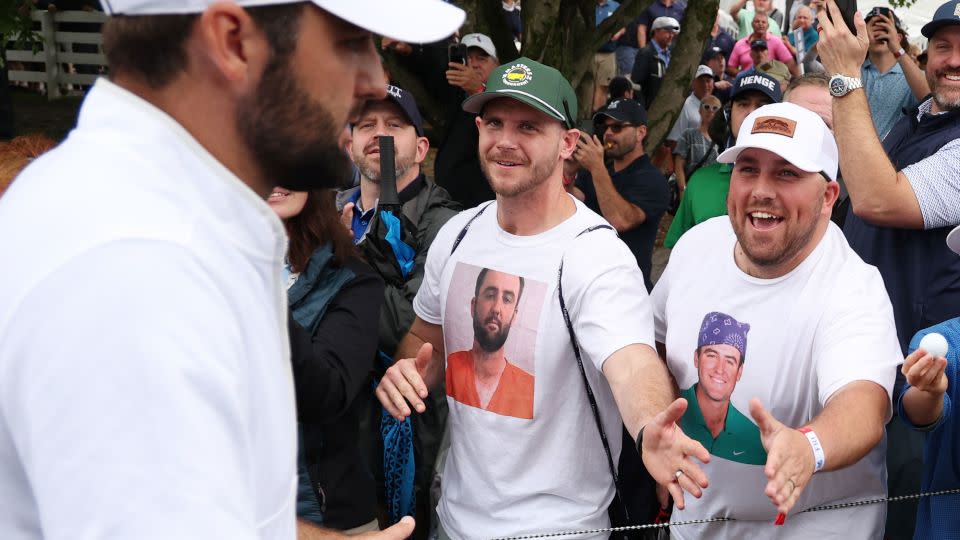 Scheffler walks past fans during the second round. - Patrick Smith/Getty Images