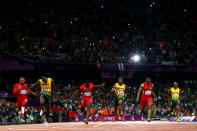 Usain Bolt of Jamaica crosses the finish line ahead of Ryan Bailey of the United States, Yohan Blake of Jamaica and Justin Gatlin of the United States to win the Men's 100m Final on Day 9 of the London 2012 Olympic Games at the Olympic Stadium on August 5, 2012 in London, England. (Photo by Michael Steele/Getty Images)