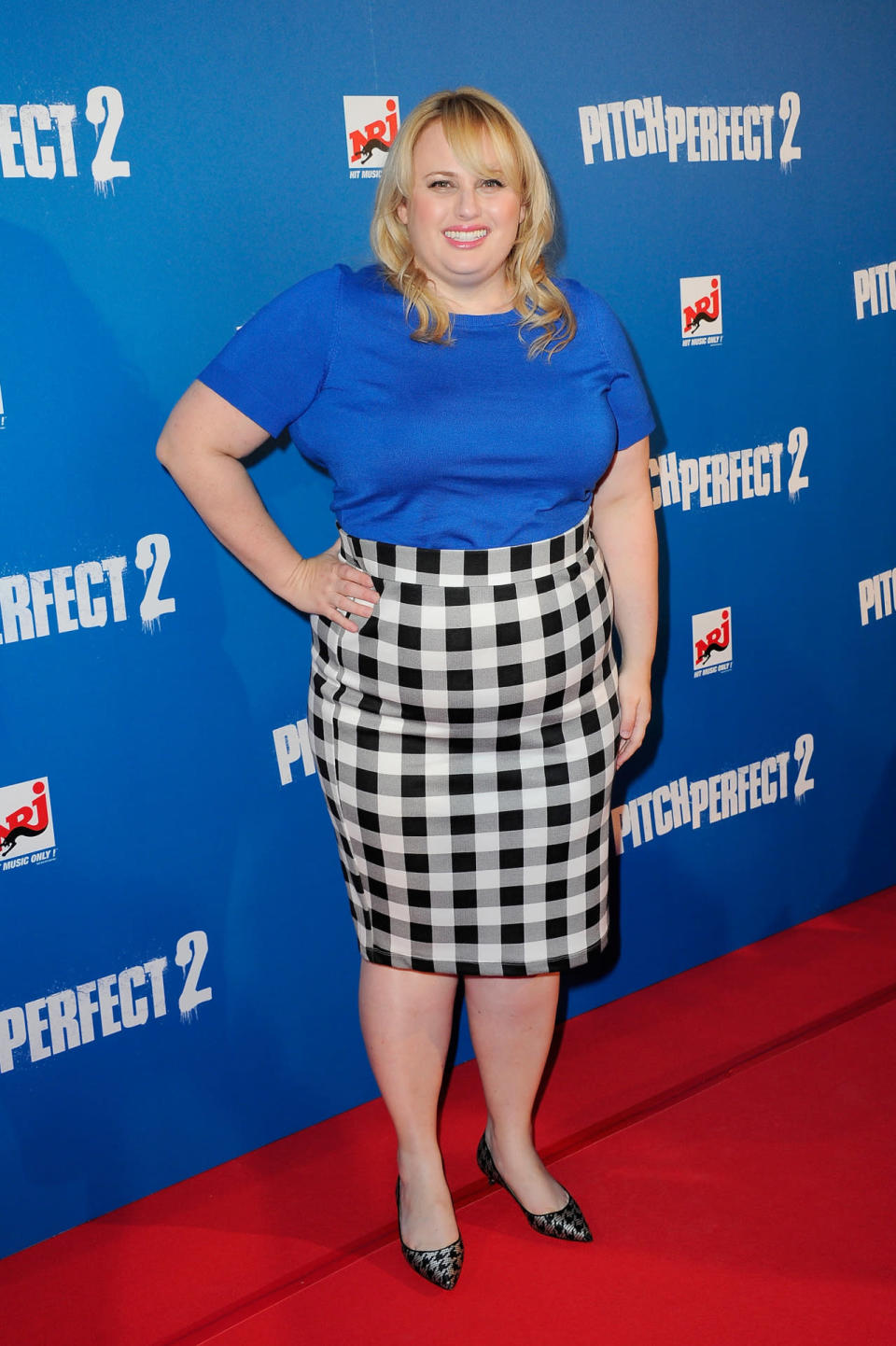 Wilson mixed it up with a black and white checkered pencil skirt, which she tempered with a royal blue T-shirt.
