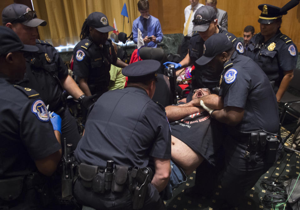 Health care bill protesters descend on Senate hearing