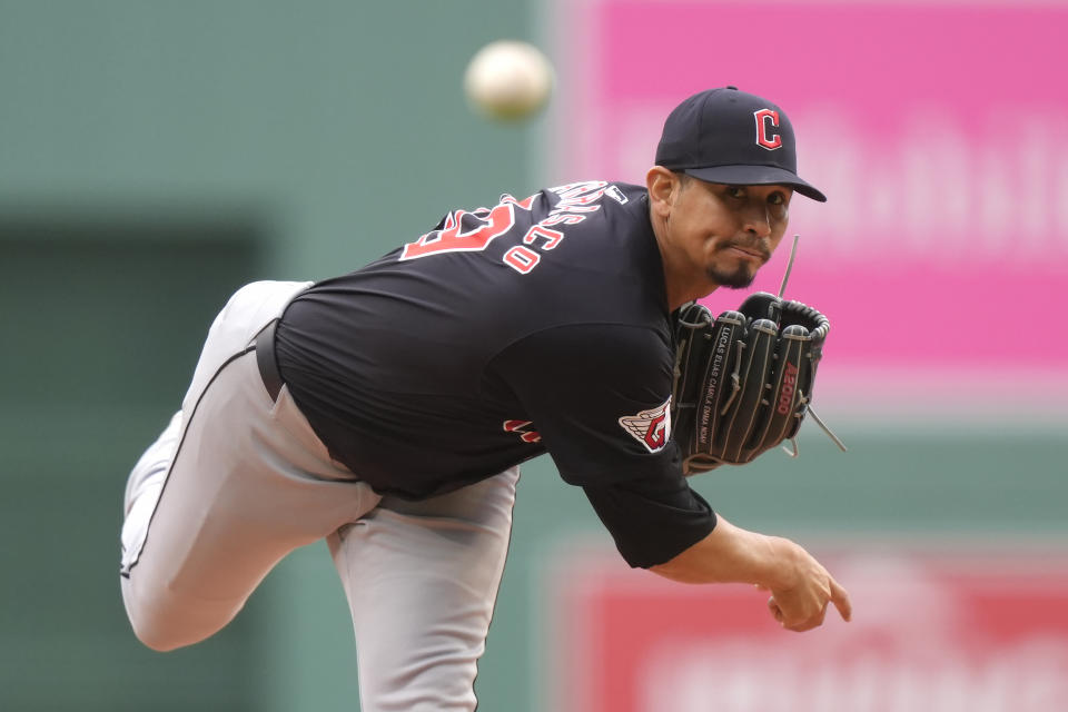 Cleveland Guardians' Carlos Carrasco delivers a pitch to a Boston Red Sox batter in the first inning of a baseball game, Thursday, April 18, 2024, in Boston. (AP Photo/Steven Senne)