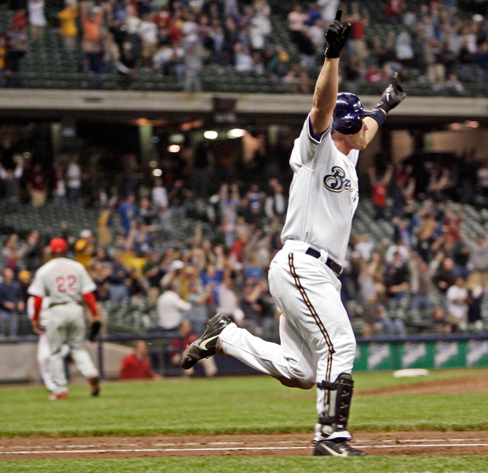 Milwaukee Brewers outfielder Geoff Jenkins raises his hands after driving in the winning run  in the 9th inning to beat the Philadelphia Phillies 8-7 at Miller Park Wednesday, May 17, 2006.