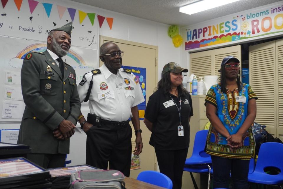 From left, military veterans Charlie Jackson, Walter Cason, Ingrid Rincon and Kizzy McCray-Sheppard were the panelists on Friday during “Veterans In The Classrooms” at Caring and Sharing Learning School in SE Gainesville.
(Credit: Photo provided by Voleer Thomas)