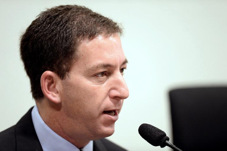 Glenn Greenwald testifies in Brasilia on October 9, 2013 before the investigative committee of the Senate that examines charges of espionage by the United States