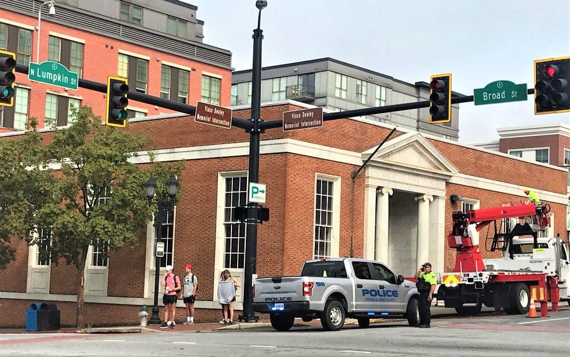 Signage was installed Monday morning at Lumpkin and Broad streets honoring former UGA football coach Vince Dooley.