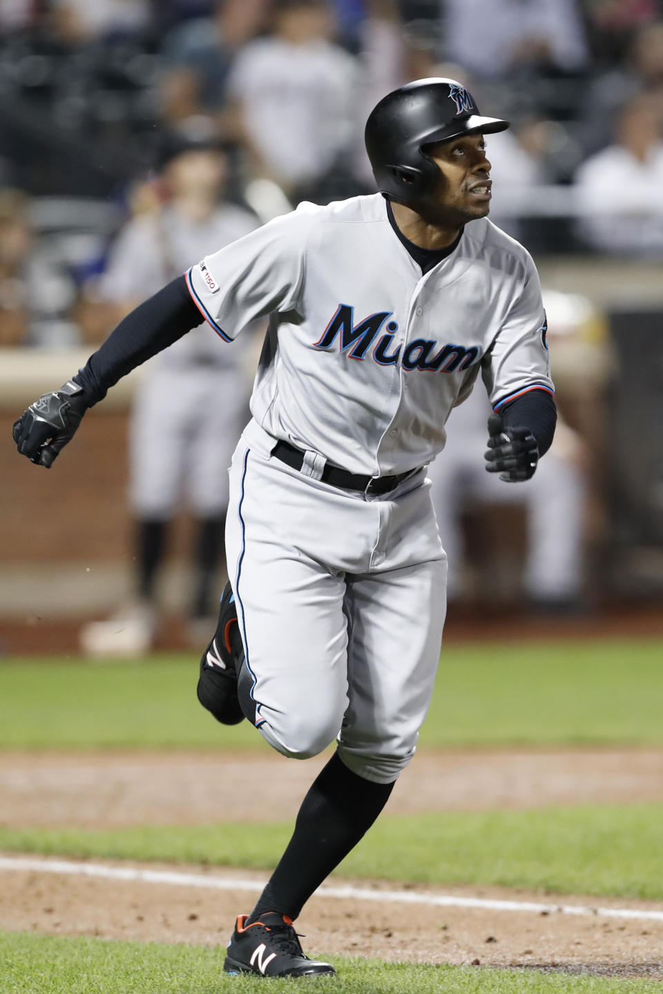 Miami Marlins' Curtis Granderson runs down the first base line as he watches his eighth-inning solo home run in a baseball game against the New York Mets, Thursday, Sept. 26, 2019, in New York. (AP Photo/Kathy Willens)