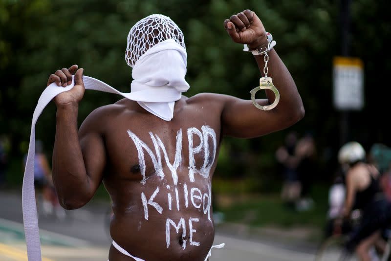 A demonstrator reacts during a protest against racial inequality in the aftermath of the death in Minneapolis police custody of George Floyd, at Grand Army Plaza in the Brooklyn borough of New York City