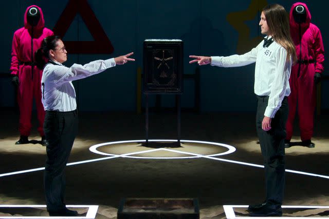 <p>Courtesy of Netflix</p> Mai and Phill play rock/paper/scissors in the season 1 finale