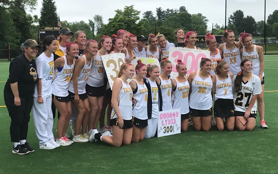 Tatnall players celebrate after Lydia Colasante (4) scored her 300th career goal Saturday in a 21-6 home win over Caesar Rodney in the second round of the DIAA Girls Lacrosse Tournament.