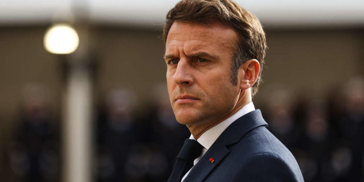 French President Emmanuel Macron looks on as he attends a tribute ceremony to veterans of the Algerian War, at the Hotel National des Invalides, in Paris on October 18, 2022. - The tribute paid on October 18, 2022 by Emmanuel Macron to veterans of the Algerian war aims to recall that 