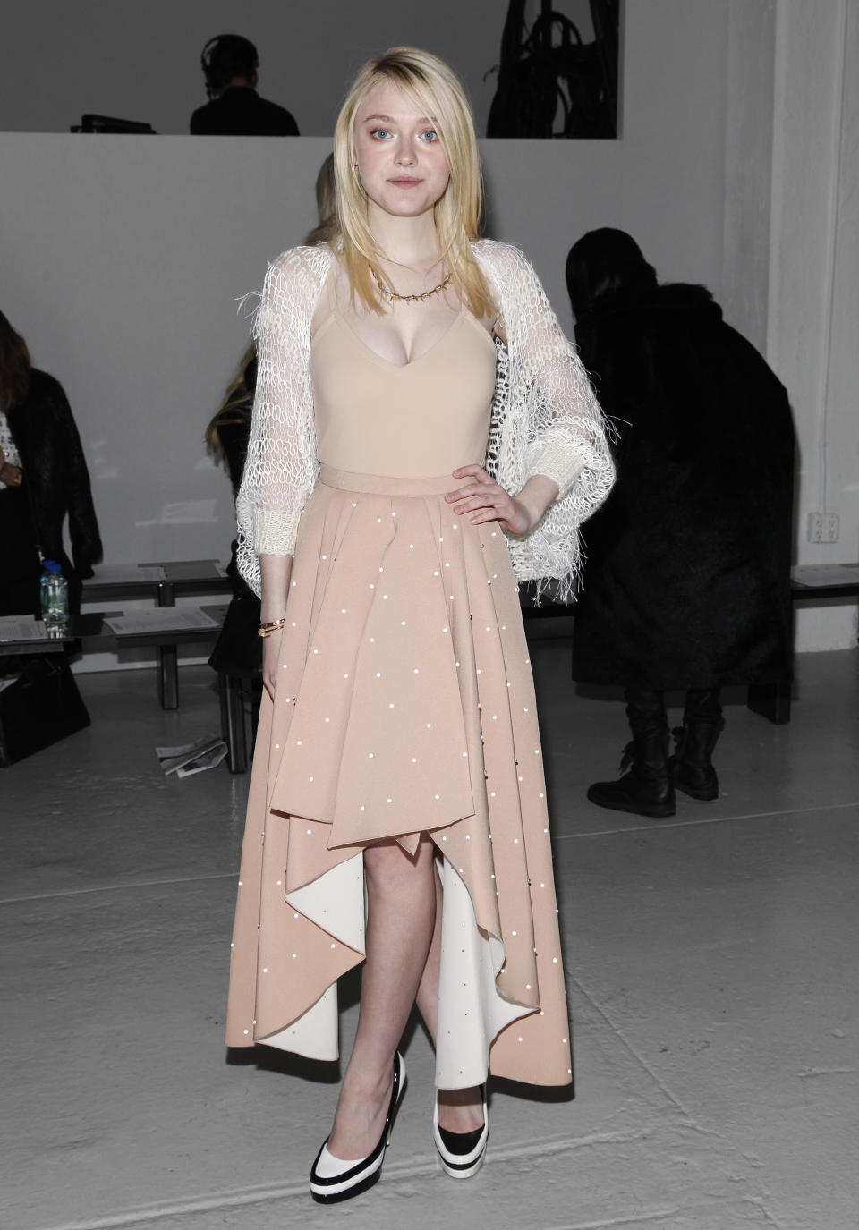Actress Dakota Fanning attends the Rodarte 2014 Fall/Winter Collection during Mercedes Benz Fashion Week on Tuesday, Feb. 11, 2014, in New York. (Photo by Amy Sussman/Invision/AP)
