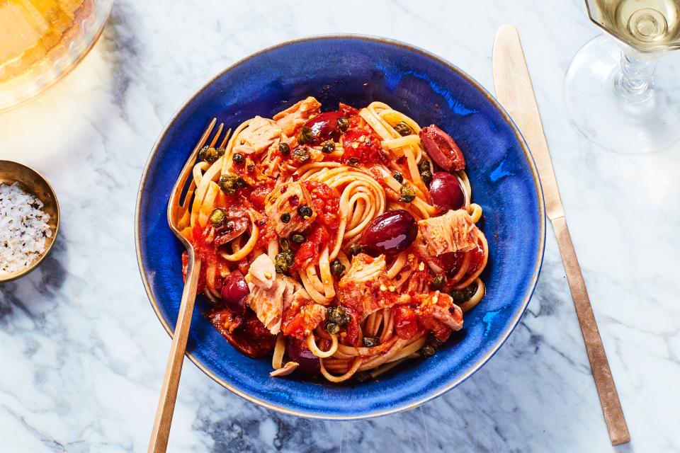 Keep these ingredients stocked in your pantry, and a briny, flavor-packed, classic Italian pasta will always be a dinner option. <a rel="nofollow noopener" href="https://www.epicurious.com/recipes/food/views/pantry-pasta-puttanesca?mbid=synd_yahoo_rss" target="_blank" data-ylk="slk:See recipe.;elm:context_link;itc:0;sec:content-canvas" class="link ">See recipe.</a>