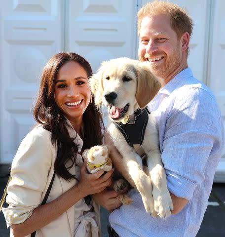 <p>Chris Jackson/Getty Images</p> Prince Harry with Meghan Markle in Germany in September