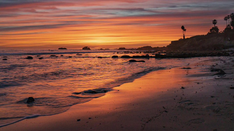 a beach at sunset