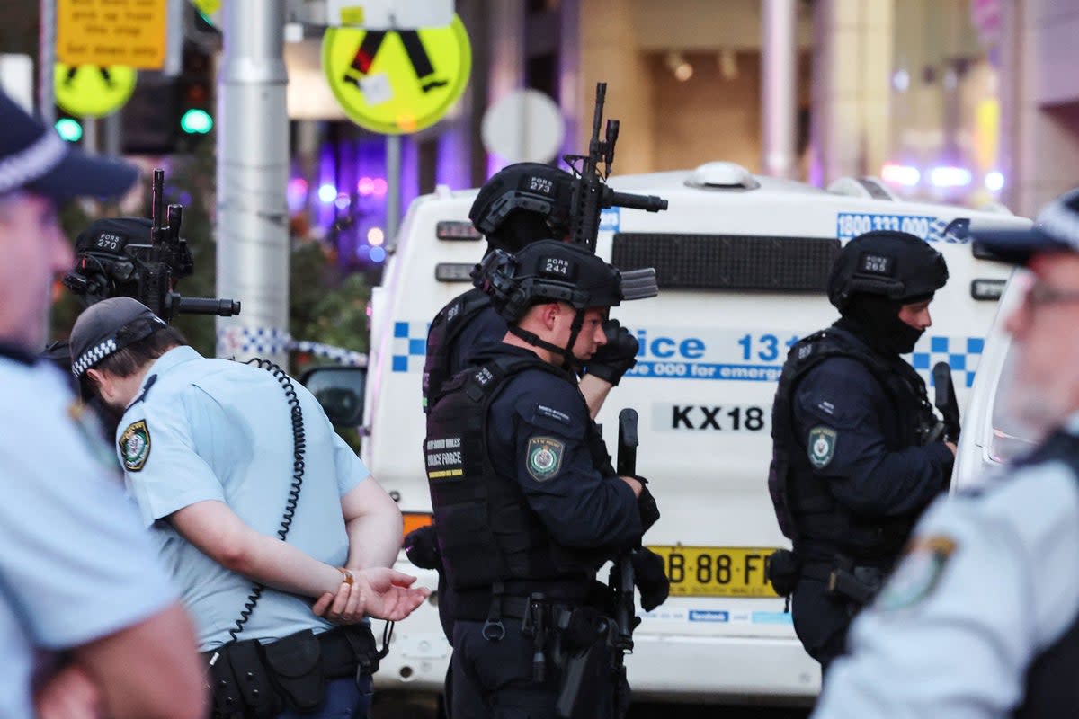 Police enter the Westfield Bondi Junction shopping mall (AFP via Getty Images)