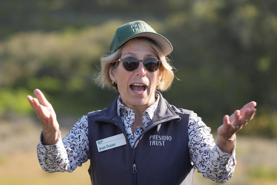 Jean Fraser, CEO of The Presidio Trust, speaks before the release of silvery blue butterflies, the closest relative to the extinct Xerces blue butterfly, in the Presidio's restored dune habitat in San Francisco, Thursday, April 11, 2024. (AP Photo/Eric Risberg)