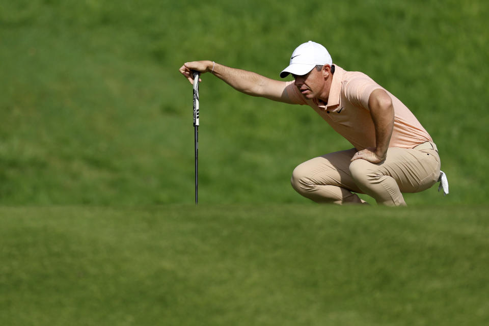 Rory McIlroy, of Northern Ireland, reads his putt on the fifth hole during the second round of the Genesis Invitational golf tournament at Riviera Country Club Friday, Feb. 16, 2024, in the Pacific Palisades area of Los Angeles. (AP Photo/Ryan Kang)