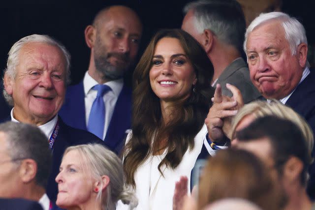<p>CLEMENT MAHOUDEAU/AFP via Getty </p> Kate Middleton watches the on-field action at the 2023 Rugby World Cup.