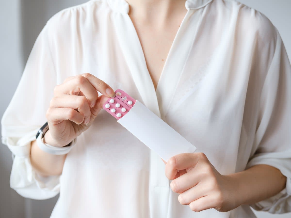 A 2023 survey found that 77 per cent of women experienced side effects from their contraception, including headaches, depression and lowered mood and sex drive (Shutterstock/KaryB)