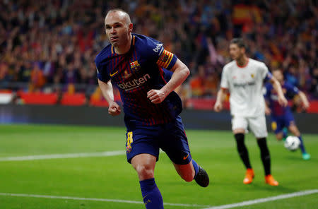 Soccer Football - Spanish King's Cup Final - FC Barcelona v Sevilla - Wanda Metropolitano, Madrid, Spain - April 21, 2018 Barcelona's Andres Iniesta celebrates scoring their fourth goal REUTERS/Juan Medina