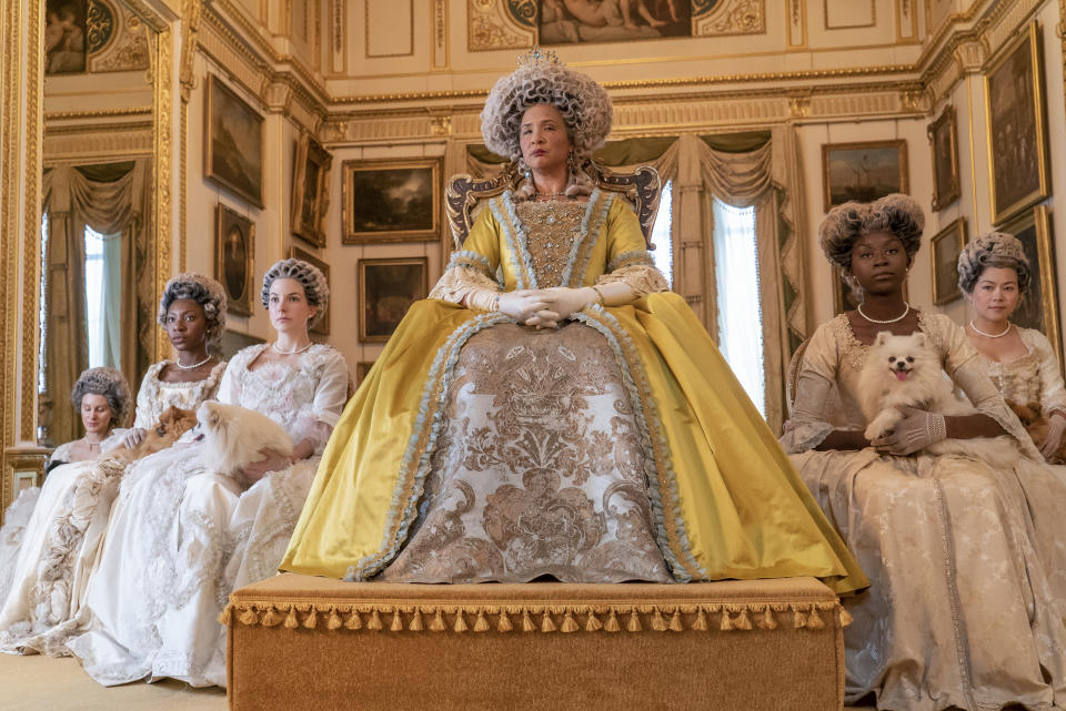 This image released by Netflix shows Golda Rosheuvel as Queen Charlotte, center, in the romance series "Bridgerton." On Friday, Feb. 26, Netflix released a study it commissioned from top academic researchers that shows the streaming giant is outpacing much of the film industry in the inclusivity of its original films and television series. (Liam Daniel/Netflix via AP)