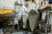 Stacked with cabinets of noodles made to Ho's family recipes, the store supplies 200 restaurants in Hong Kong and Macau as well as selling to individual customers