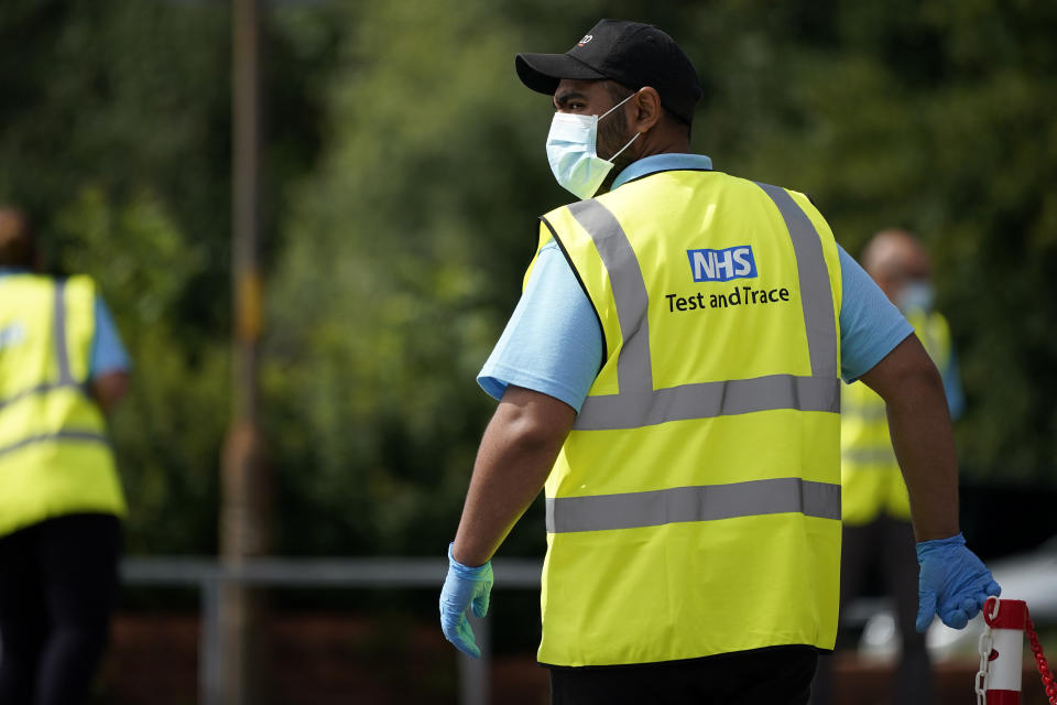 STONE, ENGLAND - JULY 30: Serco staff working on behalf of NHS Test and Trace operate a coronavirus testing centre on July 30, 2020 in Stone, England. The Staffordshire market town of Stone has seen a spike in coronavirus (Covid-19) cases after social distancing guidelines were not adhered to at the nearby Crown and Anchor pub. (Photo by Christopher Furlong/Getty Images)