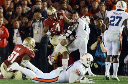 Jan 6, 2014; Pasadena, CA, USA; Florida State Seminoles wide receiver Kelvin Benjamin (1) catches a touchdown pass over Auburn Tigers cornerback Chris Davis (11) during the second half of the 2014 BCS National Championship game at the Rose Bowl. Mandatory Credit: Jayne Kamin-Oncea-USA TODAY Sports